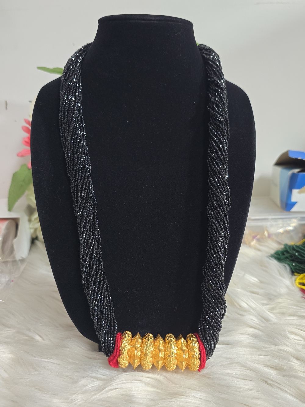 Handcrafted Black Beaded Necklace with Gold Accent